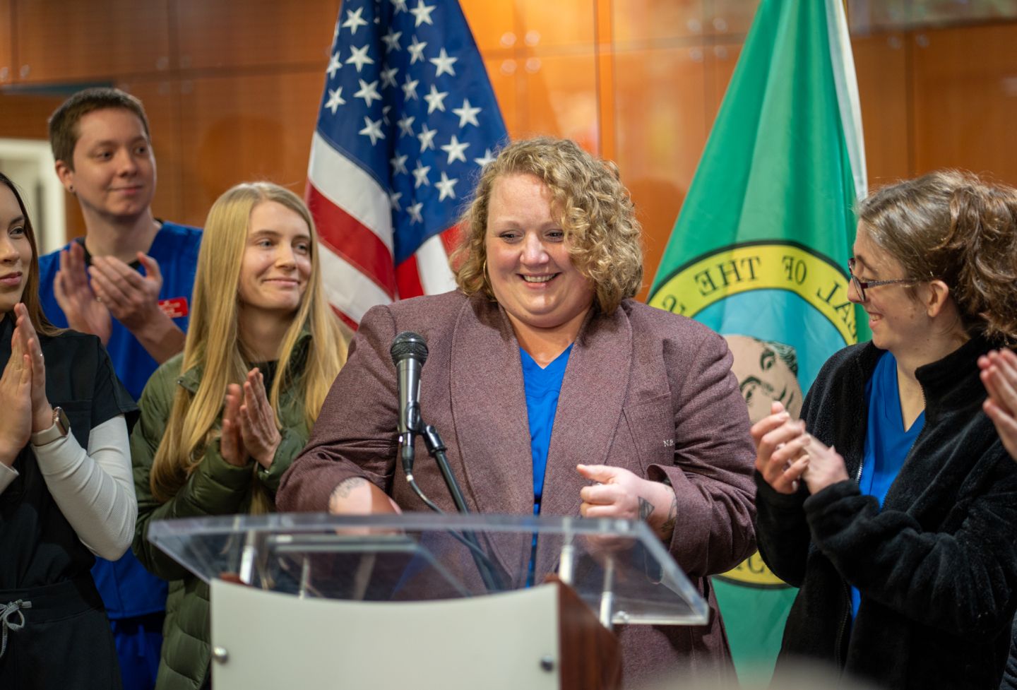 Student Nicole Boyd speaking at podium