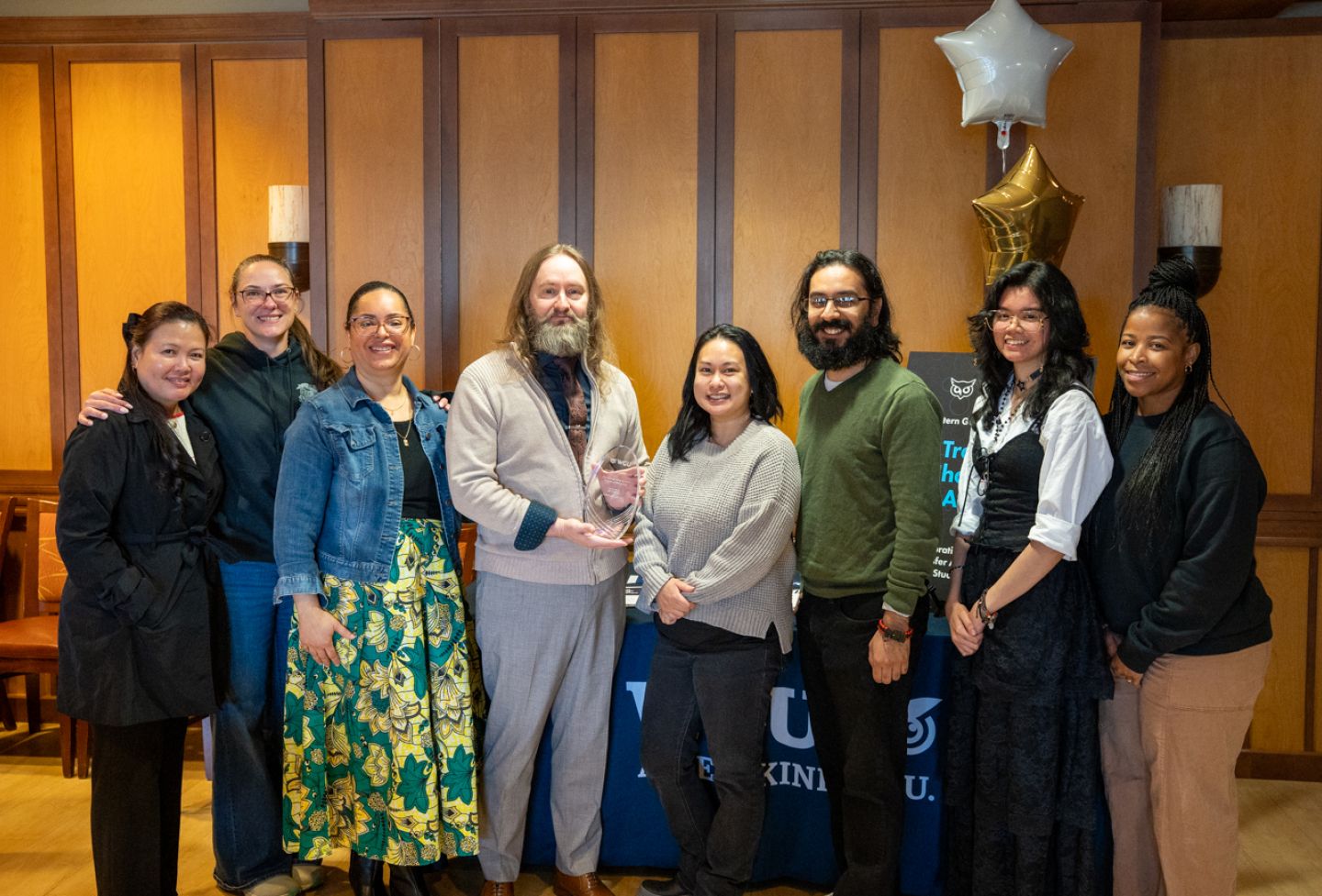 Marcus Lane poses with colleagues after being named Transfer Champion