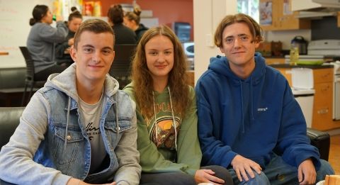 International students at the residence hall community room.